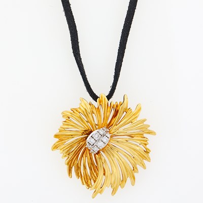Lot 2049 - Dankner Two-Color Gold and Diamond Pendant-Brooch with Cord Necklace
