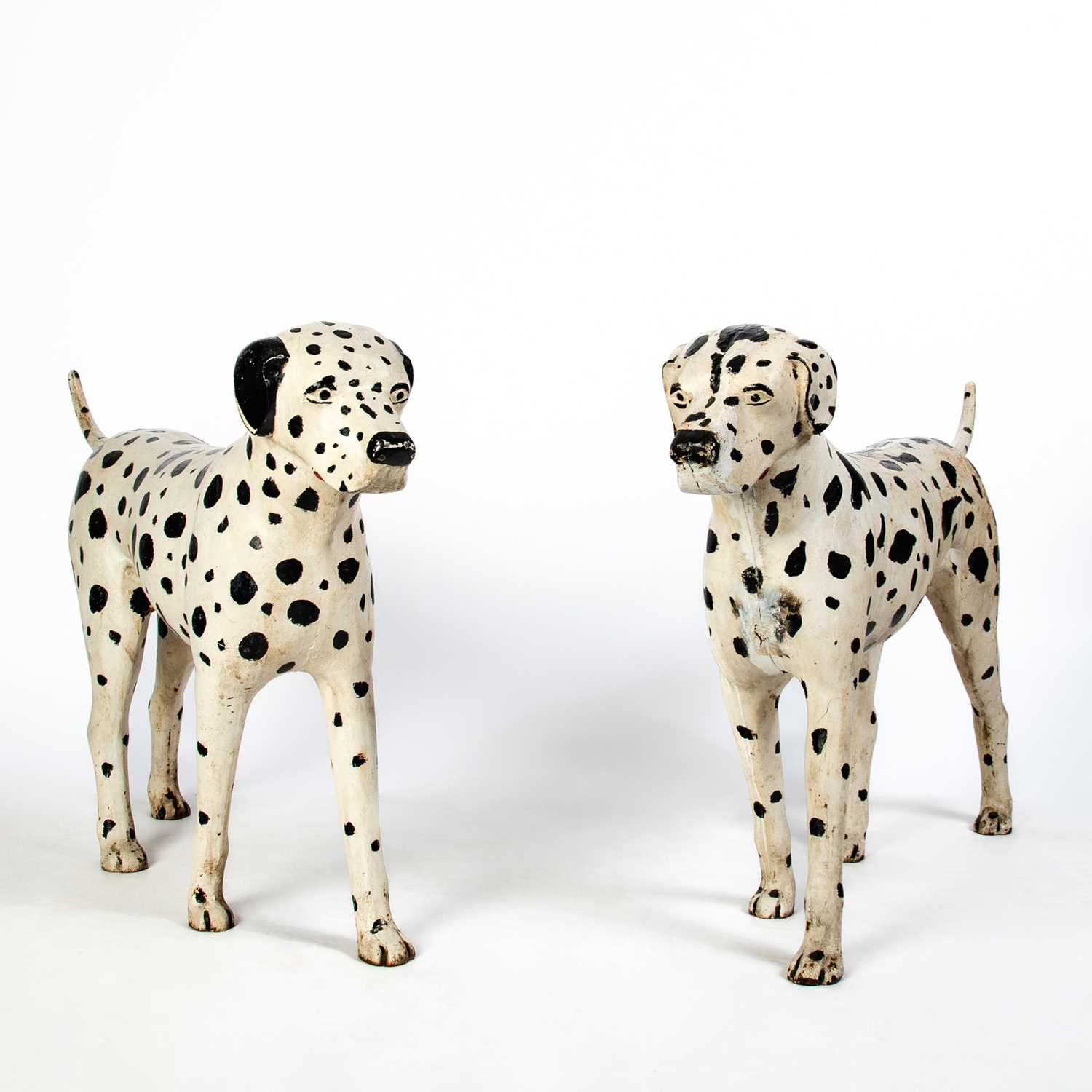 Lot 1202 - Pair of Cast Iron Painted Dalmatian Dog Figures