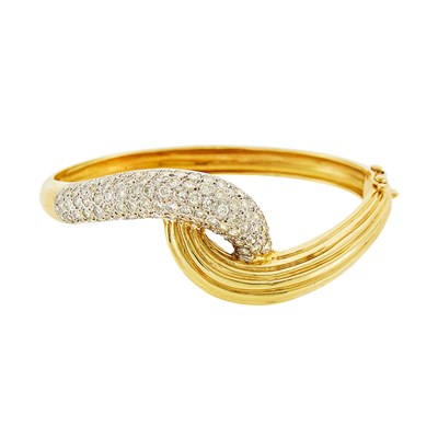 Lot 1038 - Two-Color Gold and Diamond Bracelet