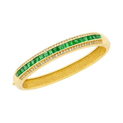 Lot 1147 - Gold, Emerald and Diamond Bangle Bracelet