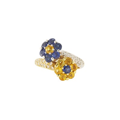 Lot 1261 - Gregg Ruth Two-Color Gold, Sapphire, Yellow Sapphire and Diamond Floret Crossover Ring