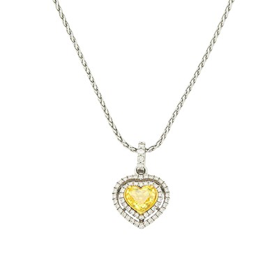 Lot 1077 - White Gold, Fancy Vivid Yellow Diamond and Diamond Heart Pendant with Chain Necklace