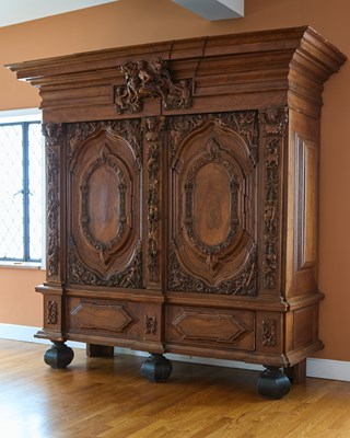 Lot 385 - Large North German Baroque Carved and Inlaid Walnut and Part Ebonized Schrank