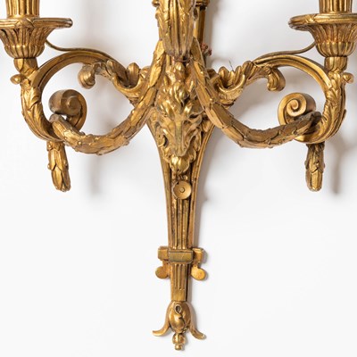 Lot 243 - Pair of Louis XVI Style Three-Light Gilt-Metal Sconces with Ram's Heads
