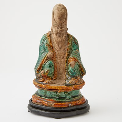 Lot 689 - A Chinese Glazed Pottery Figure of a Scholar