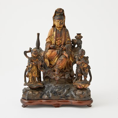 Lot 509 - A Chinese Gilt Lacquered Wood Guanyin with Attendants