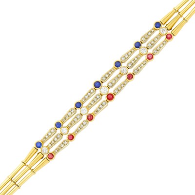Lot 1083 - Triple Strand Gold, Diamond, Ruby and Sapphire Bracelet
