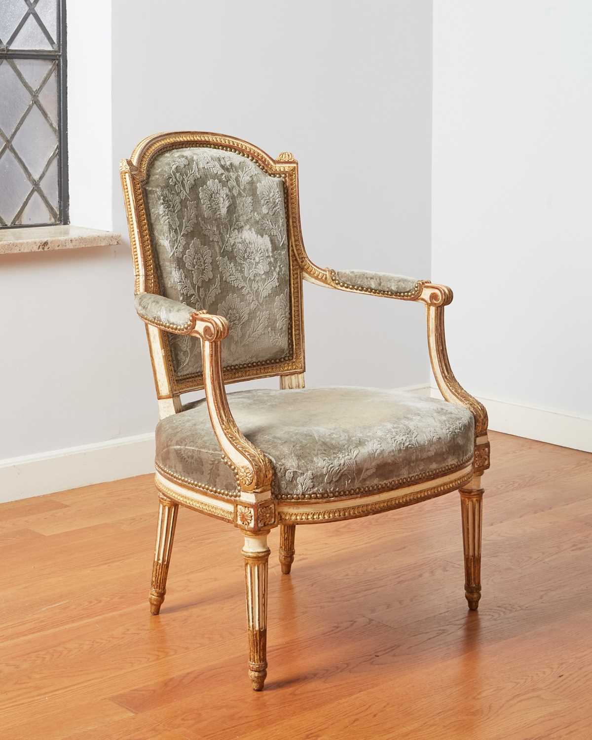 Lot 288 - Louis XVI Painted and Parcel-Gilt Fauteuil