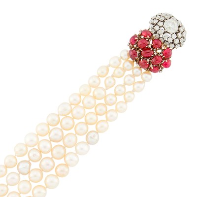 Lot 2109 - Seaman Schepps Four Strand Semi-Baroque Cultured Pearl, White Gold, Cabochon Ruby and Simulated Diamond Bracelet