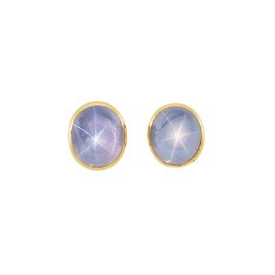 Lot 1057 - Pair of Gold and Multicolored Star Sapphire Earclips