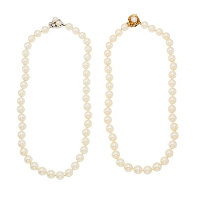 Lot 1104 - Two Cultured Pearl Necklaces with Yellow and White Gold, Sapphire and Diamond Clasps