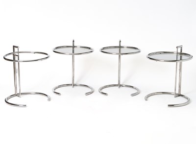 Lot 330 - Group Of Four Chrome Steel And Glass ‘E 1027’ Adjustable Tables