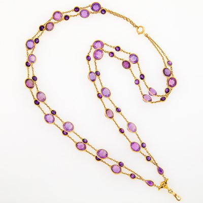 Lot 2011 - Long Double Strand Gold and Amethyst Necklace