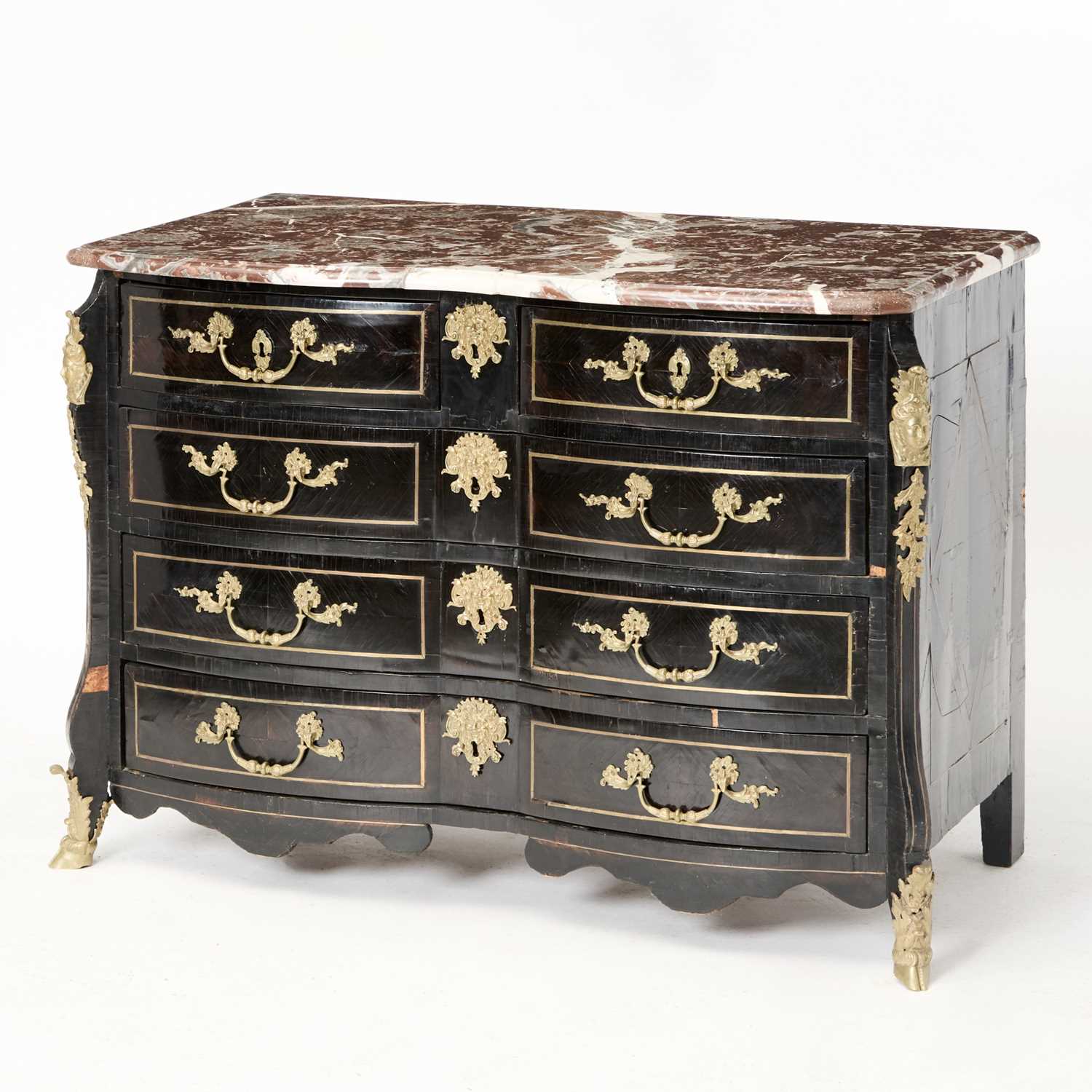 Lot 385 - Régence Gilt-Mounted and Brass-Inlaid Ebonized Commode