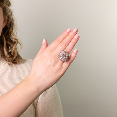 Lot 37 - Lorenz Bäumer Paris White Gold, Colored Diamond, Diamond and Pink Sapphire 'Sea Urchin' Ring