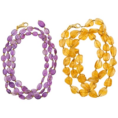 Lot 1283 - Attributed to Julie Baker Two Long Tumbled Amethyst and Citrine Bead and Gold Necklace Fragements