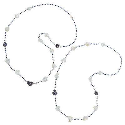 Lot 1093 - Pair of Long White Gold, Baroque Cultured Pearl, Sapphire Bead, Sapphire and Diamond Chain Necklaces