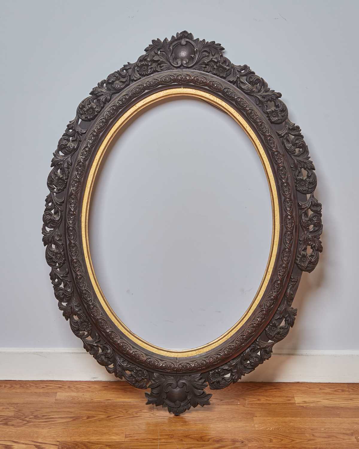 Lot 355 - Rococo Style Carved Walnut Oval Frame