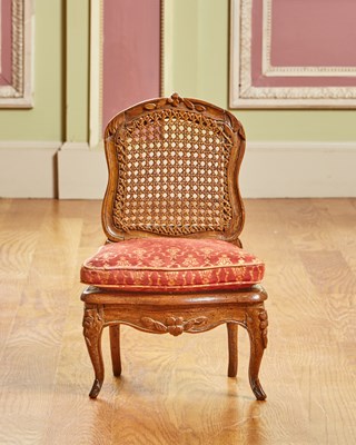 Lot 337 - Louis XV Caned Beechwood Miniature Chaise
