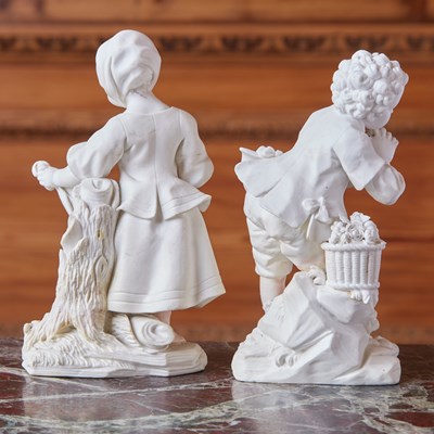 Lot 416 - Matched Pair of Sèvres Biscuit Porcelain Figures 'La Petite Fille Au Tablier' & 'Le Jeune Suppliant'