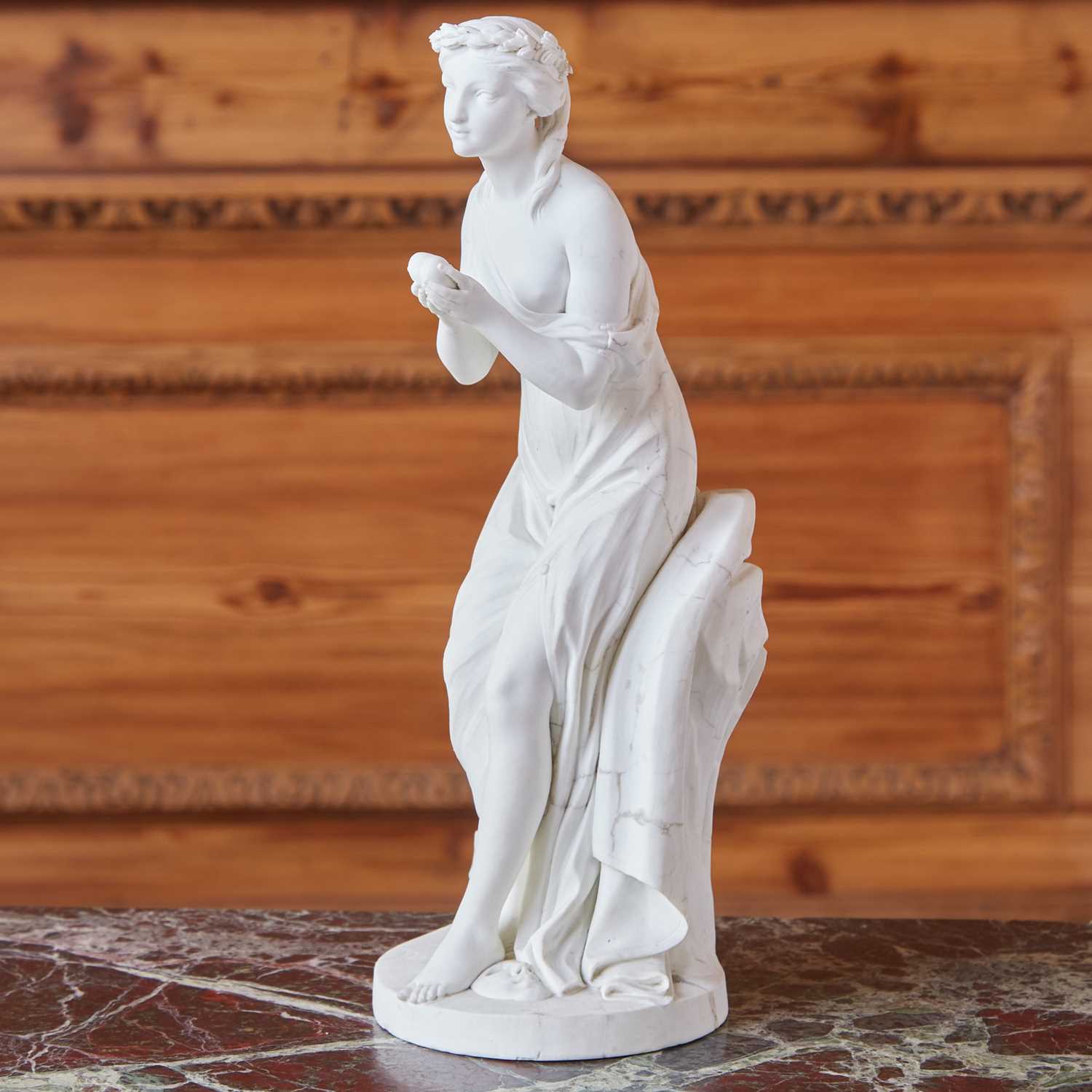 Lot 423 - Sèvres Biscuit Porcelain Figure, 'L'Amitie Tendant Son Couer a Deux Mains'