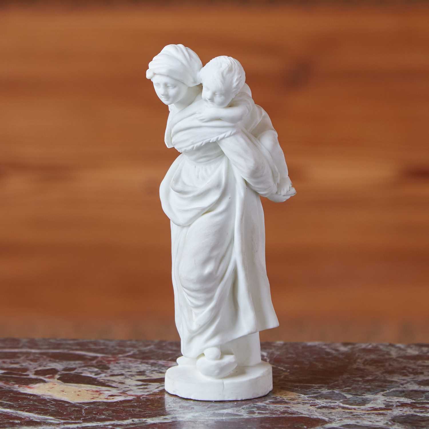 Lot 496 - FRENCH BISCUIT PORCELAIN FIGURE GROUP OF A MOTHER AND CHILD