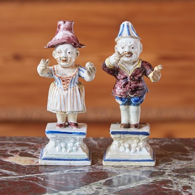 Lot 505 - PAIR OF CONTINENTAL PEARLWARE FIGURES OF DWARVES IN THE ROLE OF PUNCH AND JUDY