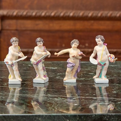 Lot 409 - FOUR MEISSEN PORCELAIN FIGURES OF PUTTI EMBLEMATIC OF THE ARTS AND SCIENCES