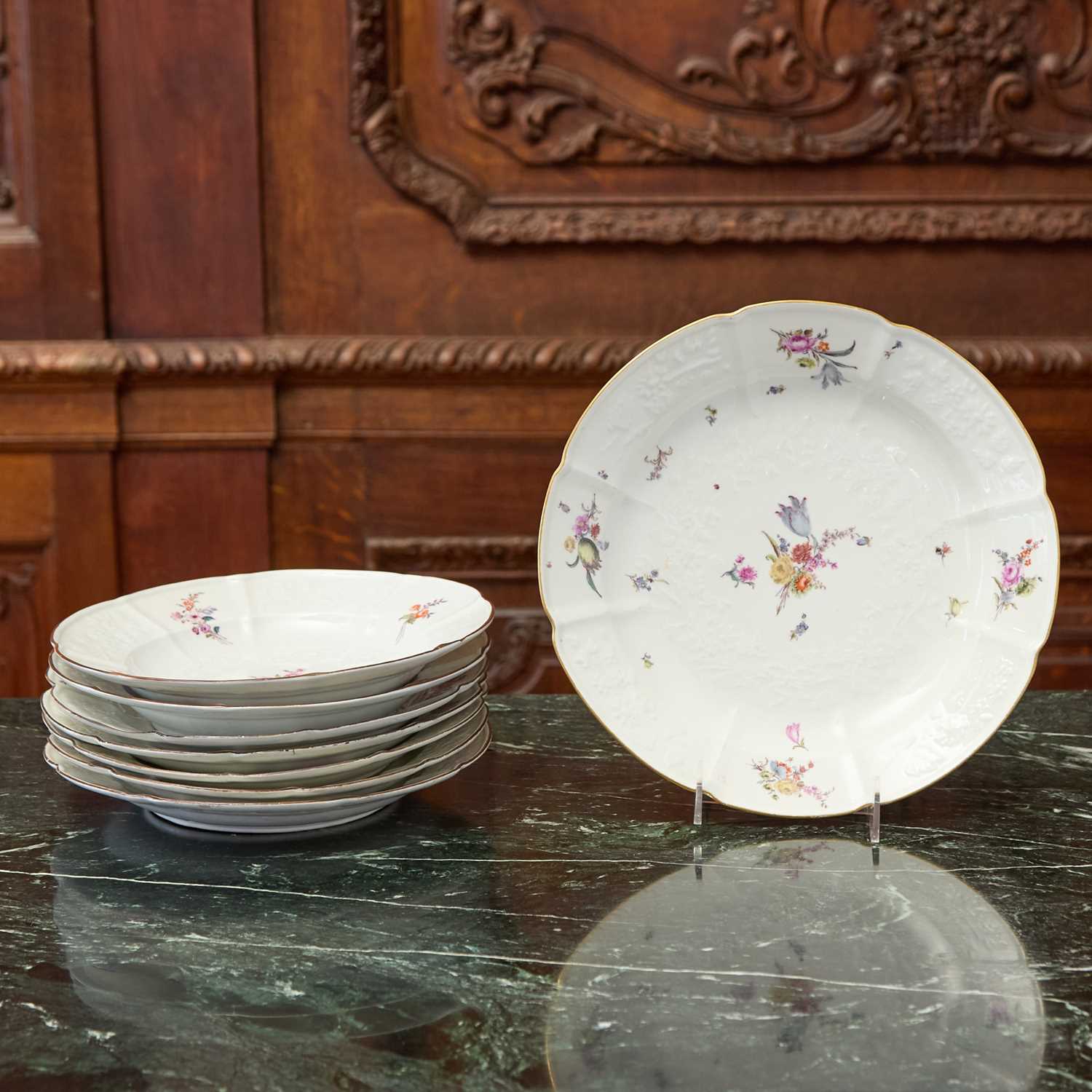 Lot 395 - Seven Meissen Porcelain Molded Flower Decorated Plates and a Small Charger