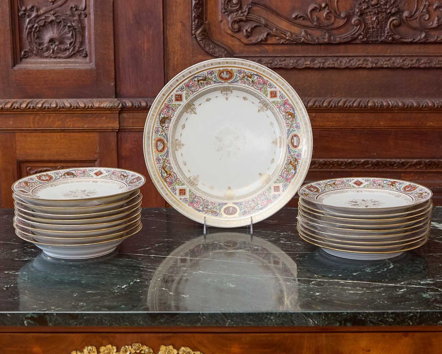 Lot 550 - EIGHTEEN SEVRES-STYLE PORCELAIN PLATES AND A LARGE CHARGER