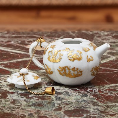 Lot 408 - SILVER-GILT MOUNTED CHINESE PORCELAIN SMALL LOBED TEAPOT AND COVER WITH APPLIQUE GOLD DECORATION