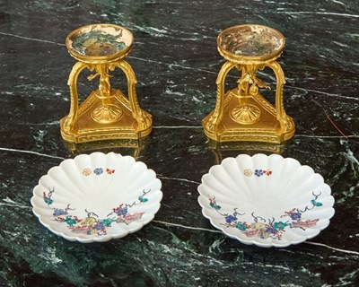 Lot 429 - PAIR OF LOUIS XVI PERIOD GILT-BRONZE TREFOIL STANDS MOUNTED WITH CHANTILLY PORCELAIN FLUTED DISHES