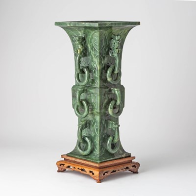 Lot 437 - A Chinese Spinach Jade Gu Vase and Stand