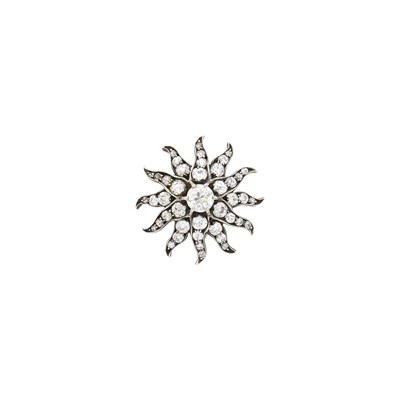 Lot 103 - Tiffany & Co. Antique Silver, Gold and Diamond Sunburst Pendant-Brooch