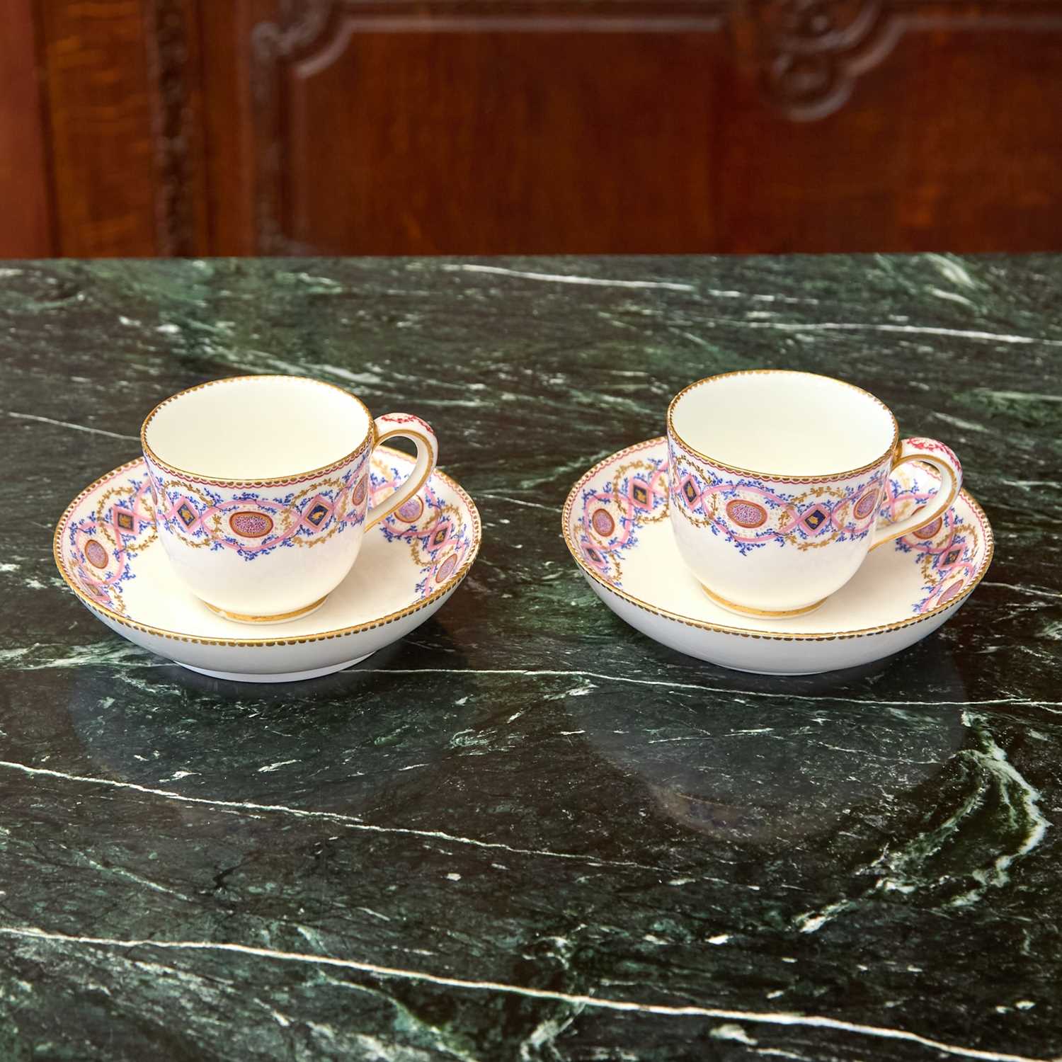 Lot 420 - Pair of Sèvres Porcelain 'Frises Riches' Cups and Saucers (Gobelet Bouillard)