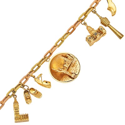 Lot 1178 - Two-Color Gold, Low Karat Gold and Metal Charm Bracelet