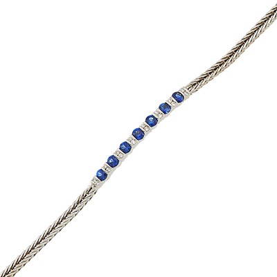 Lot 1089 - White Gold, Synthetic Sapphire and Diamond Bracelet