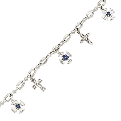 Lot 1118 - White Gold, Sapphire and Diamond Cross Charm Bracelet