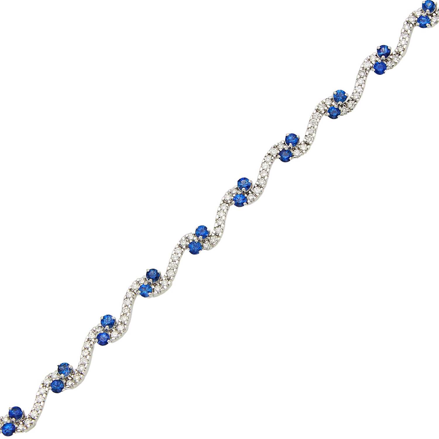 Lot 1129 - White Gold, Sapphire and Diamond Bracelet