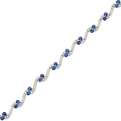 Lot 1129 - White Gold, Sapphire and Diamond Bracelet