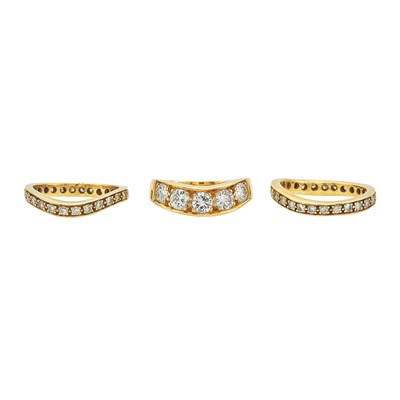 Lot 1037 - Three Gold and Diamond Band Rings