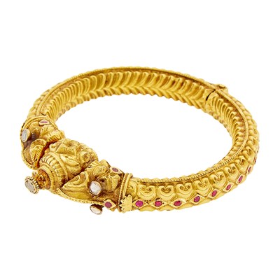 Lot 1164 - Indian High Karat Gold, Foil-Backed Diamond and Ruby Bangle Bracelet