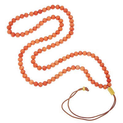 Lot 1152 - Linda Lee Johnson Coral Bead Necklace with Leather Cord and Gold Slide