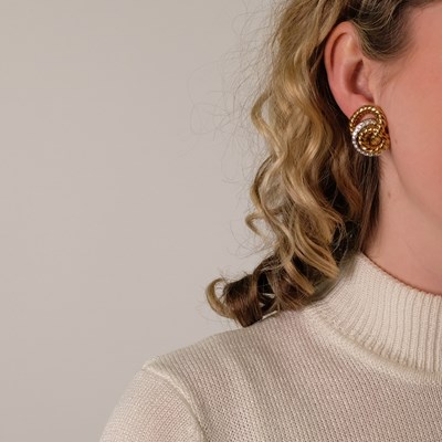 Lot 114 - Pair of Two-Color Gold and Diamond Fluted Circle Link Earclips