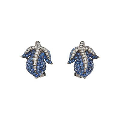 Lot 1075 - Pair of Blackened Gold, Sapphire and Diamond Leaf Earclips