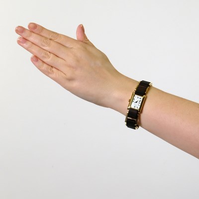Lot 41 - Gucci Gold and Wood Link Wristwatch