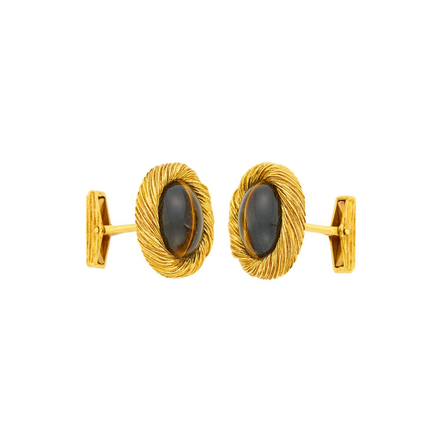 Lot 32 - Van Cleef & Arpels Pair of Gold and Tiger's Eye Cufflinks