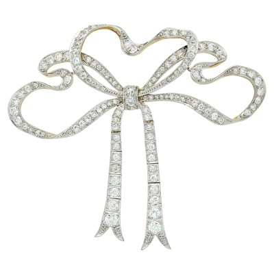 Lot 167 - Belle Époque Platinum, Gold and Diamond Bow Brooch