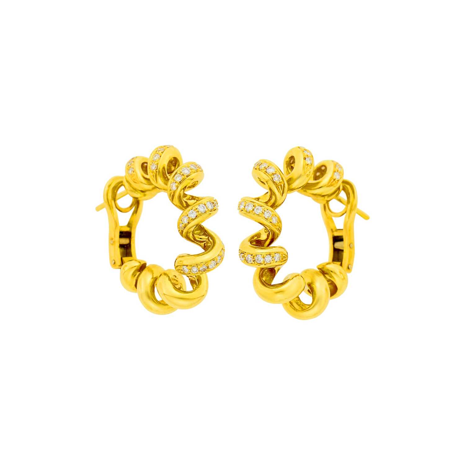 Lot 157 - Boucheron Pair of Gold and Diamond Twist Hoop Earrings, France