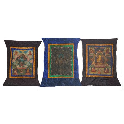 Lot 94 - A Group of Three Tibetan Thangkas
